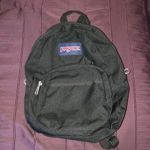 Black mini Jansport backpack in perfect condition